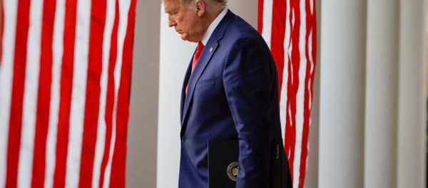 U.S. President Donald Trump walks down the West Wing colonnade from the Oval Office to the Rose Garden to deliver an update on the so-called Operation Warp Speed program, the joint Defense Department and HHS initiative that has struck deals with several drugmakers in an effort to help speed up the search for effective treatments for the ongoing coronavirus disease (COVID-19) pandemic, at the White House in Washington, U.S., November 13, 2020. U.S. President Donald Trump walks down the West Wing colonnade from the Oval Office to the Rose Garden to deliver an update on the so-called Operation Warp Speed program, the joint Defense Department and HHS initiative that has struck deals with several drugmakers in an effort to help speed up the search for effective treatments for the ongoing coronavirus disease (COVID-19) pandemic, at the White House in Washington, U.S., November 13, 2020. - Sputnik International