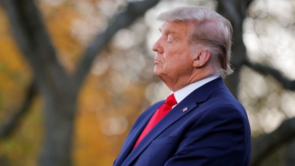 U.S. President Donald Trump listens to Vice President Mike Pence speak during an event about the Operation Warp Speed program, the joint Defense Department and HHS initiative that has struck deals with several drugmakers in an effort to help speed up the search for effective treatments for the ongoing coronavirus disease (COVID-19) pandemic, in the Rose Garden of the White House in Washington, U.S., November 13, 2020.  - Sputnik International