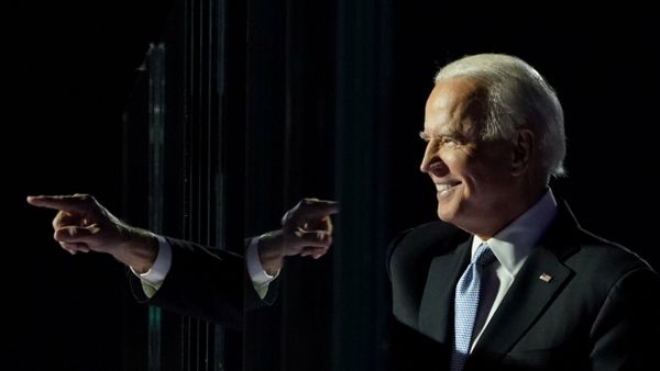 President-elect Joe Biden points a finger at his election rally in Wilmington, Delaware, November 7. REUTERS/Kevin Lamarque - Sputnik International