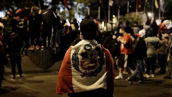 People gather outside Congress after Peru's interim President Manuel Merino announced his resignation, in Lima, Peru November 15, 2020. - Sputnik International