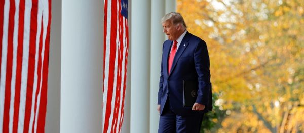 U.S. President Donald Trump walks down the West Wing colonnade from the Oval Office to the Rose Garden to deliver an update on the so-called Operation Warp Speed program, the joint Defense Department and HHS initiative that has struck deals with several drugmakers in an effort to help speed up the search for effective treatments for the ongoing coronavirus disease (COVID-19) pandemic, at the White House in Washington, U.S., November 13, 2020. U.S. President Donald Trump walks down the West Wing colonnade from the Oval Office to the Rose Garden to deliver an update on the so-called Operation Warp Speed program, the joint Defense Department and HHS initiative that has struck deals with several drugmakers in an effort to help speed up the search for effective treatments for the ongoing coronavirus disease (COVID-19) pandemic, at the White House in Washington, U.S., November 13, 2020. - Sputnik International
