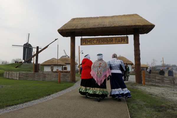 Women dressed in historical costumes walk around the premises of the newly-inaugurated ethno village Slobozhanschina in the Belgorod Region. Women dressed in historical costumes walk around the premises of the newly-inaugurated ethno village Slobozhanschina in the Belgorod Region. - Sputnik International