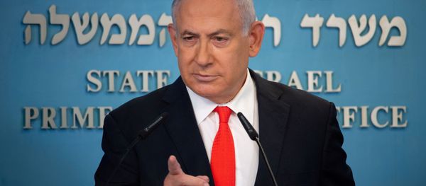  Israeli Prime Minister Benjamin Netanyahu attends a briefing on the coronavirus disease (COVID-19) development in Israel at his office in Jerusalem September 13, 2020 - Sputnik International