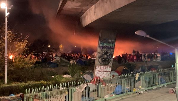 French Authorities Clear Migrants From Camp in Saint-Denis - Sputnik International