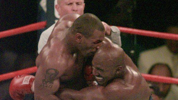 FILE -- Mike Tyson bites into the ear of Evander Holyfield in the third round of their WBA Heavyweight match Saturday, June 28, 1997, at the MGM Grand in Las Vegas - Sputnik International