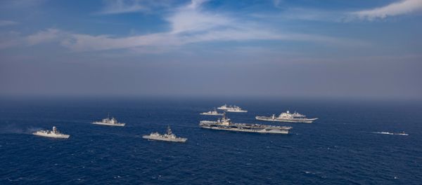 This handout photo taken and released by the Indian Navy on November 17, 2020 shows a ships taking part in the second phase of the Malabar naval exercise in the Arabian sea. - India, Australia, Japan and the United States started the second phase of a strategic navy drill on November 17 in the Northern Arabian sea. - Sputnik International