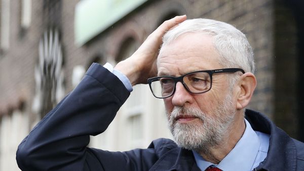 Britain's Labour party leader Jeremy Corbyn leaves after a press conference on the coronavirus, outside the Finsbury Park Jobcentre, in north London,  Sunday, March 15, 2020. - Sputnik International