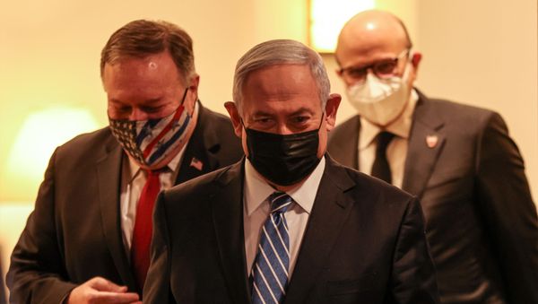 US Secretary of State Mike Pompeo, Israeli Prime Minister Benjamin Netanyahu, and Bahrain's Foreign Minister Abdullatif bin Rashid Al Zayani, all mask-clad due to the COVID-19 coronavirus pandemic, arrive for a press conference after their trilateral meeting in Jerusalem on November 18, 2020. US Secretary of State Mike Pompeo, Israeli Prime Minister Benjamin Netanyahu, and Bahrain's Foreign Minister Abdullatif bin Rashid Al Zayani, all mask-clad due to the COVID-19 coronavirus pandemic, arrive for a press conference after their trilateral meeting in Jerusalem on November 18, 2020. - Sputnik International