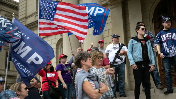 Trump supporters demonstrate at the Michigan state capitol on November 08, 2020 in Lansing, Michigan. Militia members had pledged to attend the Stop the Steal demonstration, claiming the presidential election had been stolen. - Sputnik International