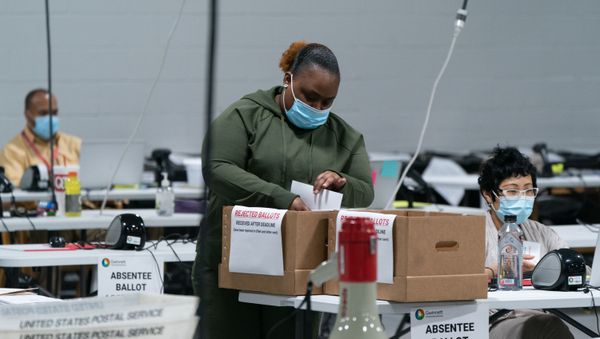 Election personnel sort ballots in preparation for an audit at the Gwinnett County Board of Voter Registrations and Elections offices on 7 November 2020 in Lawrenceville, Georgia. Several counties in Georgia continued to count ballots even as news outlets have declared Joe Biden the winner of the race for President.  - Sputnik International