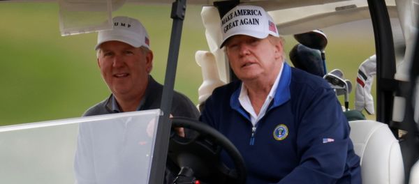 U.S. President Donald Trump drives a golf cart at the Trump National Golf Club in Sterling, Virginia, U.S., November 22, 2020 - Sputnik International
