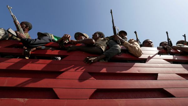 Members of Amhara region militias ride on their truck as they head to the mission to face the Tigray People's Liberation Front (TPLF), in Sanja, Amhara region near a border with Tigray, Ethiopia November 9, 2020 Members of Amhara region militias ride on their truck as they head to the mission to face the Tigray People's Liberation Front (TPLF), in Sanja, Amhara region near a border with Tigray, Ethiopia November 9, 2020 - Sputnik International
