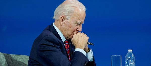 US President-elect Joe Biden listens as he holds a videoconference meeting with members of the US Conference of Mayors at his transition headquarters in Wilmington, Delaware, on 23 November 2020. REUTERS/Joshua Roberts - Sputnik International