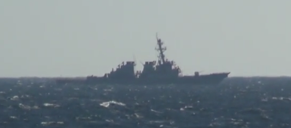 The US Navy destroyer USS John C. McCain, filmed from the deck of the Russian frigate Admiral Vinogradov as the McCain performed a freedom of navigation operation in Russia's Peter the Great Gulf on November 24, 2020 - Sputnik International