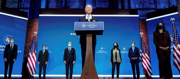 President-elect Joe Biden stands with his nominees for his national security team at his transition headquarters in the Queen Theater in Wilmington, Delaware, U.S., November 24, 2020 - Sputnik International