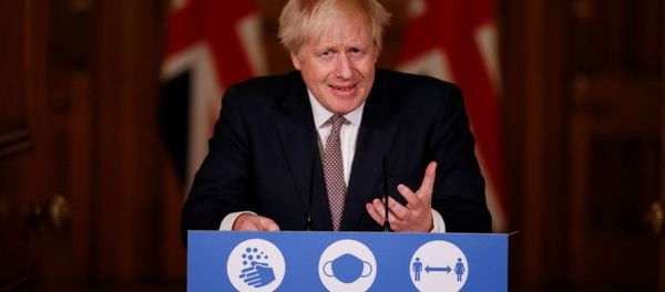 Britain's Prime Minister Boris Johnson speaks during a news conference on the ongoing situation with the coronavirus disease (COVID-19), at Downing Street, in London, Britain November 26, 2020.  Jamie Lorriman/Pool via REUTERS - Sputnik International