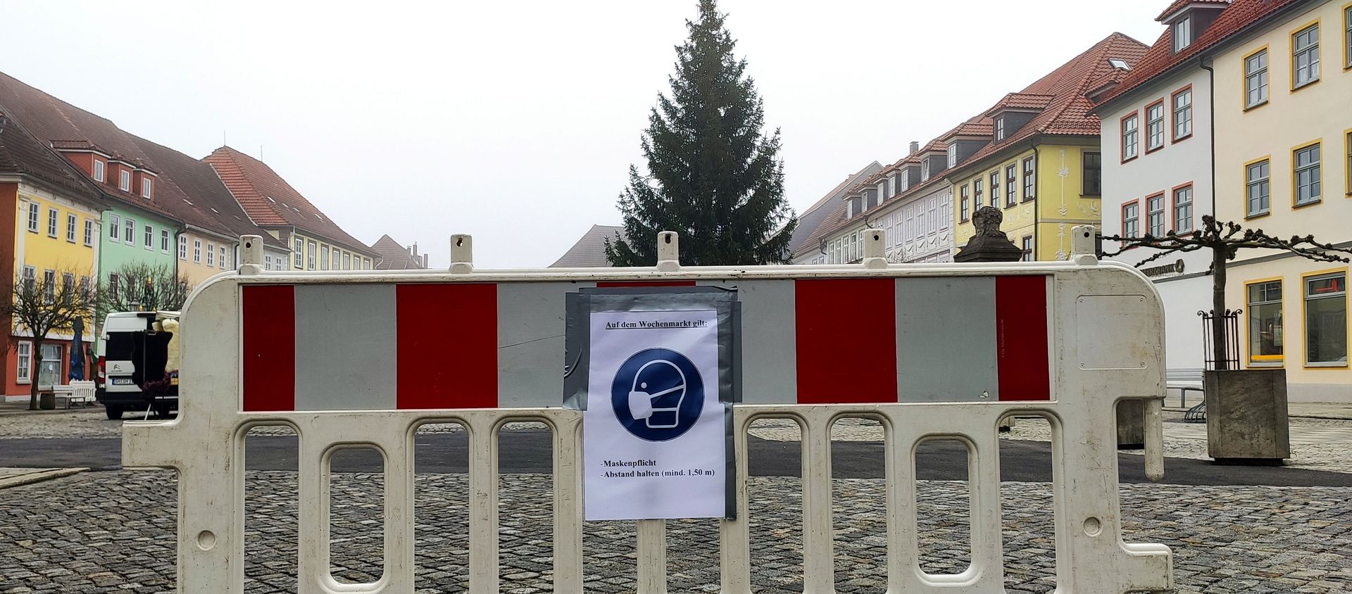 A placard reminds people to wear a protective mask and keep distance at the weekly market, as the spread of the coronavirus disease (COVID-19) continues in Hildburghausen, Germany, November 26, 2020. The state premier of Thuringia on Thursday announced a first mass test for children and teenagers in the district of Hildburghausen, Germany's coronavirus hotspot, to find out to what extent they contribute to a rapid surge in infections. A placard reminds people to wear a protective mask and keep distance at the weekly market, as the spread of the coronavirus disease (COVID-19) continues in Hildburghausen, Germany, November 26, 2020. The state premier of Thuringia on Thursday announced a first mass test for children and teenagers in the district of Hildburghausen, Germany's coronavirus hotspot, to find out to what extent they contribute to a rapid surge in infections. - Sputnik International, 1920, 13.12.2020