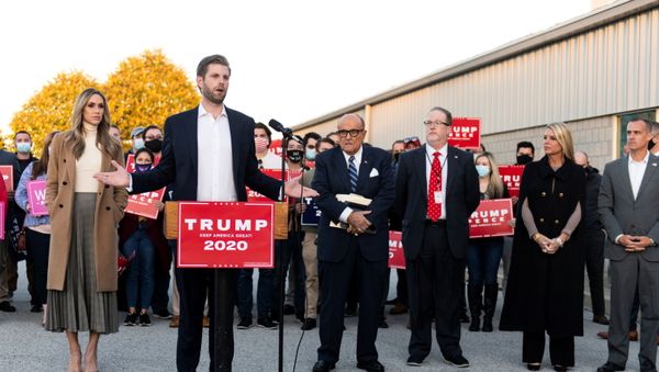 Eric Trump, son of US President Donald Trump, speaks while flanked by his wife Lara, former New York City Mayor Rudy Giuliani, Trump campaign ballot counting observer Jeremy Mercer, and former Florida Attorney General Pam Bondi during a news conference at Atlantic Aviation PHL private air terminal in Philadelphia, Pennsylvania, US, 4 November 2020. - Sputnik International