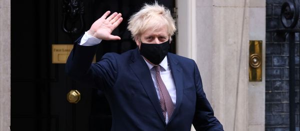 Britain's Prime Minister Boris Johnson seen in public for the first time since his self-isolation ended, leaves Downing Street during the coronavirus disease (COVID-19) outbreak in London, Britain, November 26, 2020. Britain's Prime Minister Boris Johnson seen in public for the first time since his self-isolation ended, leaves Downing Street during the coronavirus disease (COVID-19) outbreak in London, Britain, November 26, 2020. - Sputnik International