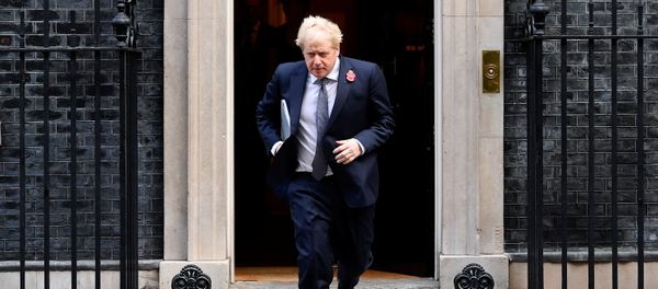 Britain's Prime Minister Boris Johnson leaves Downing Street to attend a cabinet meeting at the Foreign and Commonwealth Office (FCO) in London, Britain November 10, 2020.  - Sputnik International