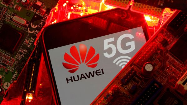 A smartphone with the Huawei and 5G network logo is seen on a PC motherboard in this illustration picture taken January 29, 2020 A smartphone with the Huawei and 5G network logo is seen on a PC motherboard in this illustration picture taken January 29, 2020 - Sputnik International