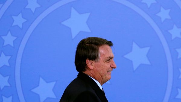 Brazil's President Jair Bolsonaro reacts during a ceremony at the Planalto Palace in Brasilia, Brazil November 26, 2020. - Sputnik International