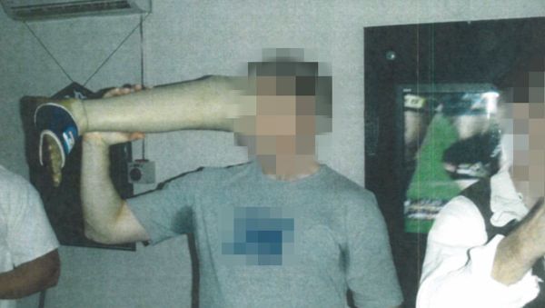 A senior Australian soldier drinks beer from a prosthetic leg that belonged to a Taliban fighter killed by special forces in Afghanistan A senior Australian soldier drinks beer from a prosthetic leg that belonged to a Taliban fighter killed by special forces in Afghanistan - Sputnik International