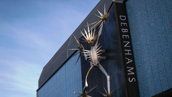 A sculpture on Debenhams' building is seen amidst the outbreak of the coronavirus disease (COVID-19), in Hanley, Stoke-on-Trent, Britain December 1, 2020. A sculpture on Debenhams' building is seen amidst the outbreak of the coronavirus disease (COVID-19), in Hanley, Stoke-on-Trent, Britain December 1, 2020. - Sputnik International