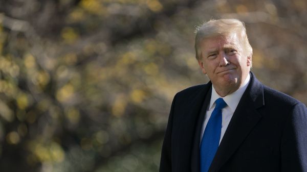 President Donald Trump walks on the South Lawn of the White House in Washington, Sunday, Nov. 29, 2020, after stepping off Marine One. Trump is returning from Camp David - Sputnik International