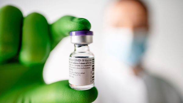 A dose of the coronavirus disease (COVID-19) vaccination of BioNTech and Pfizer is pictured in this undated handout photo, as Britain became the first western country to approve a COVID-19 vaccine, in Mainz, Germany - Sputnik International