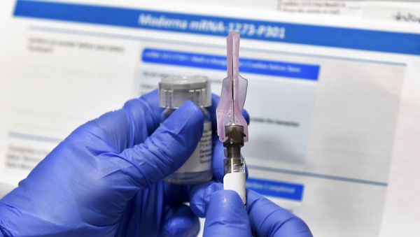 In this Aug. 14, 2020, file photo, laboratory technicians work at the mAbxience biopharmaceutical company on an experimental coronavirus vaccine developed by Oxford University and the laboratory AstraZeneca in Garin, Argentina. - Sputnik International