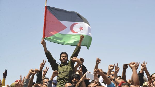 In this Friday, June 3, 2016 file photo, members of the Polisario Front, the organization disputing sovereignty over Western Sahara with Morocco, mourn their leader, Mohamed Abdelaziz, during his funerals held in the Rabouni refugees camp, south western Algeria. - Sputnik International