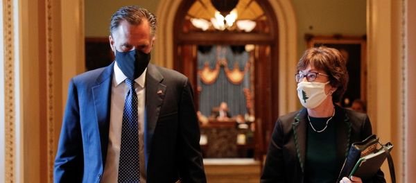 Senators Romney and Collins walk to the office of the Majority Leader from the Senate Chamber ahead of a meeting with Majority Leader McConnell on Capitol Hill in Washington Senators Romney and Collins walk to the office of the Majority Leader from the Senate Chamber ahead of a meeting with Majority Leader McConnell on Capitol Hill in Washington - Sputnik International