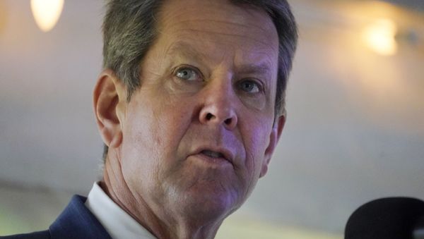 Georgia Gov. Brian Kemp speaks after touring a Bridgestone golfball manufacturing facility Thursday, Nov. 12, 2020, in Covington, Ga. - Sputnik International