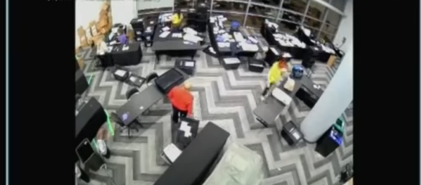 Screenshot from the video allegedly showing election staffers in Fulton County, Atlanta, Georgia, staying behind and pulling out boxes of extra ballots Screenshot from the video allegedly showing election staffers in Fulton County, Atlanta, Georgia, staying behind and pulling out boxes of extra ballots - Sputnik International
