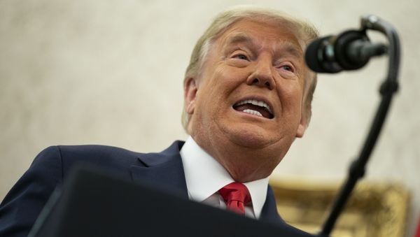 Donald Trump speaks during a ceremony to present the Presidential Medal of Freedom to former football coach Lou Holtz, in the Oval Office of the White House, Thursday, Dec. 3, 2020, in Washington. - Sputnik International