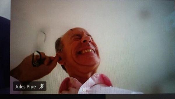 A screenshot from the video conference showing London's Deputy Mayor Jules Pipe CBE scratching his ear to get the wax out, December 3, 2020 - Sputnik International