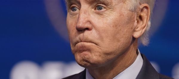 President-elect Joe Biden listens to a question as he speaks about jobs at The Queen theater, Friday, Dec. 4, 2020, in Wilmington, Del. - Sputnik International