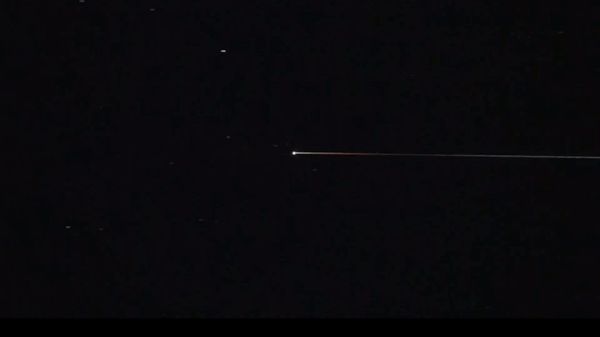 This photo provided by Japan Aerospace Exploration Agency shows the Japanese space capsule about to re-enter Earth with asteroid samples on Saturday, Dec. 5, 2020.  Japan’s Hayabusa2 spacecraft successfully released a small capsule and sent it toward Earth to deliver samples from a distant asteroid that could provide clues to the origin of the solar system and life on our planet, the country’s space agency says. - Sputnik International
