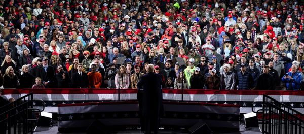 People listen as U.S. President Donald Trump speaks during a campaign rally for Republican U.S. senators David Perdue and Kelly Loeffler, ahead of their January runoff elections to determine control of the U.S. Senate, in Valdosta, Georgia, U.S., December 5, 2020. REUTERS/Jonathan Ernst? - Sputnik International