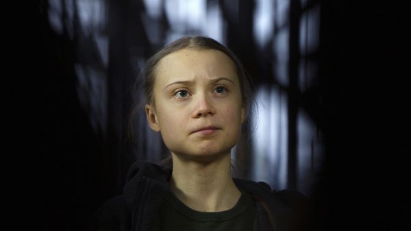 Swedish climate activist Greta Thunberg speaks with the media as she arrives for a meeting of the Environment Council at the European Council building in Brussels, Thursday, March 5, 2020 - Sputnik International