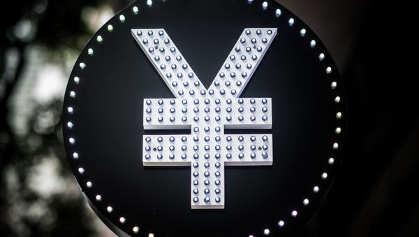A foreign currency exchange booth sign showing the symbol for the Chinese yuan is seen in Hong Kong on 13 August 2015. - Sputnik International
