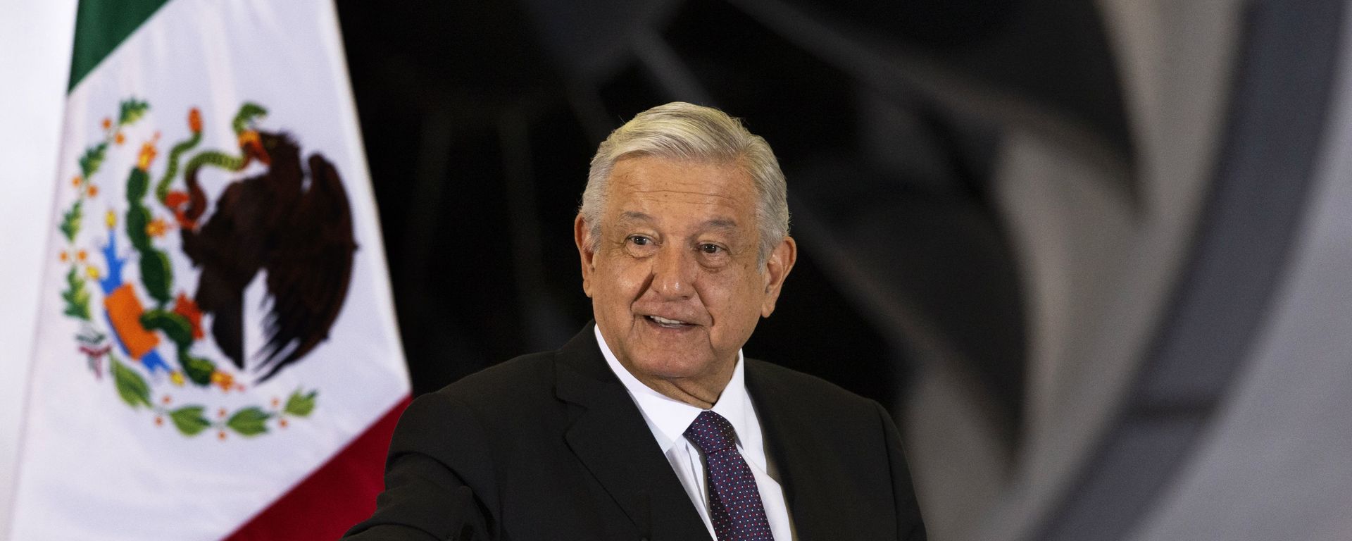 In this July 27, 2020 file photo, Mexican President Andres Manuel Lopez Obrador gives his daily, morning press conference in front of the former presidential plane that has been for sale since he took office, at Benito Juarez International Airport in Mexico City - Sputnik International, 1920, 19.03.2023