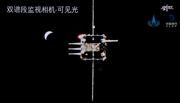 Chang'e-5 ascender is seen from the orbiter-returner combination in this handout image provided by China National Space Administration (CNSA) 6 December 2020. Chang'e-5 ascender is seen from the orbiter-returner combination in this handout image provided by China National Space Administration (CNSA) 6 December 2020. - Sputnik International