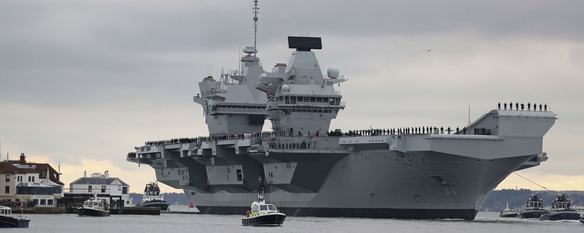 The new British aircraft carrier HMS Prince of Wales arrives at Portsmouth Naval Base after its first sea trials, in Portsmouth, southern England, 16 November 2019 The new British aircraft carrier HMS Prince of Wales arrives at Portsmouth Naval Base after its first sea trials, in Portsmouth, southern England, 16 November 2019 - Sputnik International, 1920, 08.12.2020