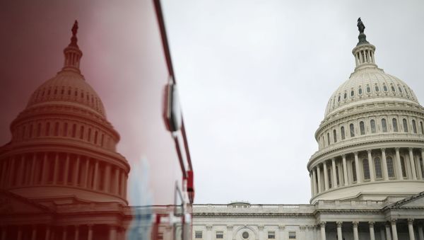 The U.S. Capitol Building is reflected on an ambulance on Capitol Hill in Washington, U.S., December 4, 2020. - Sputnik International