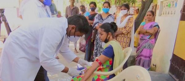 Healthcare personnel takes a blood sample from a patient during an examination, after hundreds of people were hospitalised due to an unknown illness in the southern state of Andhra Pradesh, in this still frame taken from video dated December 9, 2020 Healthcare personnel takes a blood sample from a patient during an examination, after hundreds of people were hospitalised due to an unknown illness in the southern state of Andhra Pradesh, in this still frame taken from video dated December 9, 2020 - Sputnik International