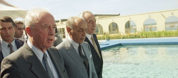 Israeli Prime Minister Yitzhak Rabin, left, walks next to King Hasan II of Morocco and Israeli's Foreign Minister Shimon Peres, right, shortly upon their arrival on Tuesday, Sept. 14, 1993 in Rabat. Israeli Prime Minister Yitzhak Rabin, left, walks next to King Hasan II of Morocco and Israeli's Foreign Minister Shimon Peres, right, shortly upon their arrival on Tuesday, Sept. 14, 1993 in Rabat. - Sputnik International