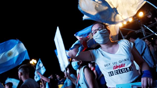 People protest against legalizing abortion, outside the National Congress in Buenos Aires, Argentina December 11, 2020. - Sputnik International