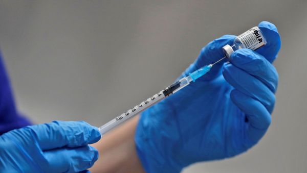 FILE PHOTO: A nurse prepares to administer the Pfizer-BioNTech COVID-19 vaccine at Guy's Hospital in London, Britain December 8, 2020. Frank Augstein/Pool via REUTERS/File Photo - Sputnik International